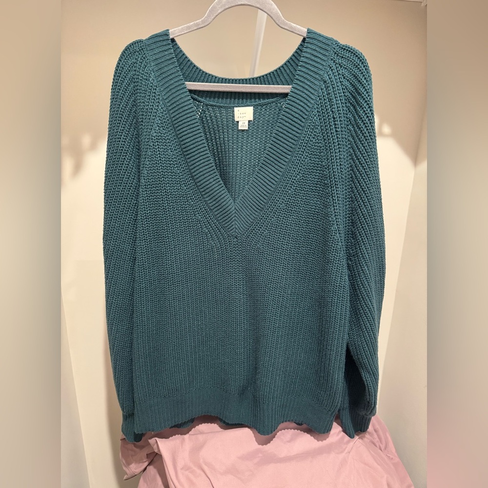 Blue green sweater